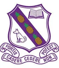 A purple shield with an image of a dog and pineapples.